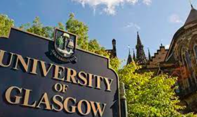 Image of University of GLasgow sign and building in background